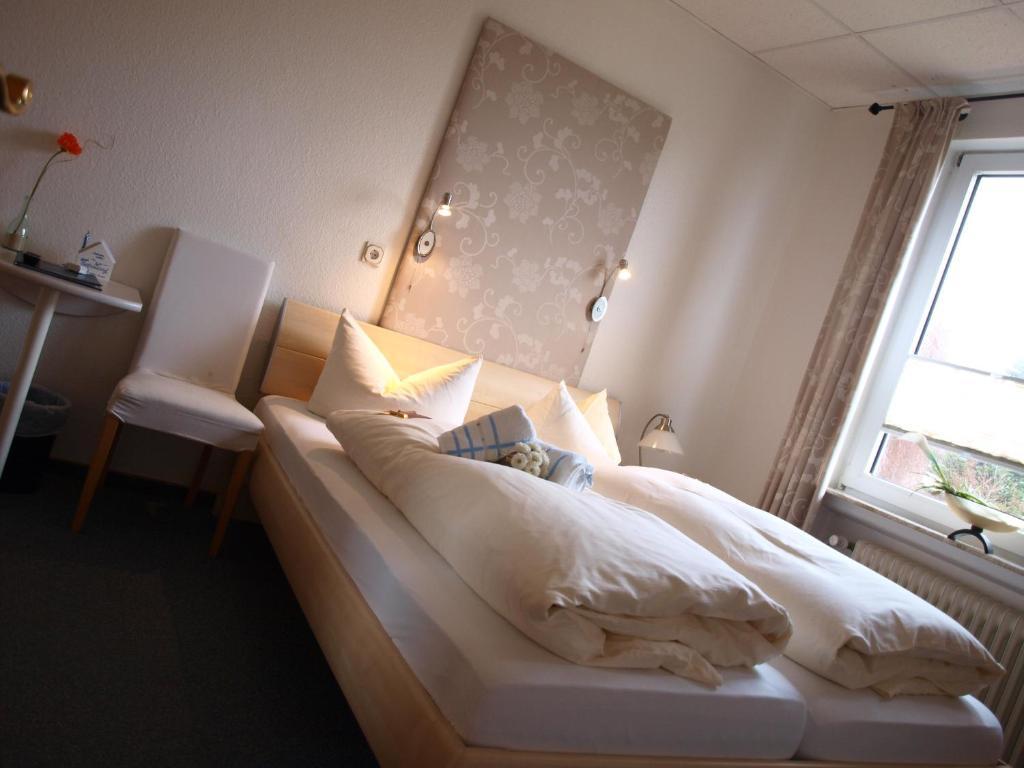 Hotel Ostfriesland Garni Норден Стая снимка